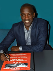 Chris Powell kindly signs one of our promotional posters